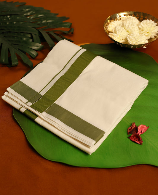Light ivory Colour cotton single dhoti with 1.5 Inch Mung Bean Colour kara, crafted for traditional elegance & comfort, for men.