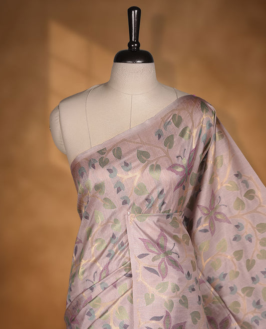 Light Lavender colour semi jamdani tussar silk saree featuring woven Floral kodi & butterfly motifs on the body, complemented by a self colour  without border pallu, paired with a matching blouse.