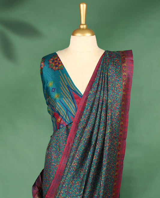 Dark teal colour Manipuri saree with multicolor micro floral patterns, magenta border with yellow detailing, and comes with a matching blouse.