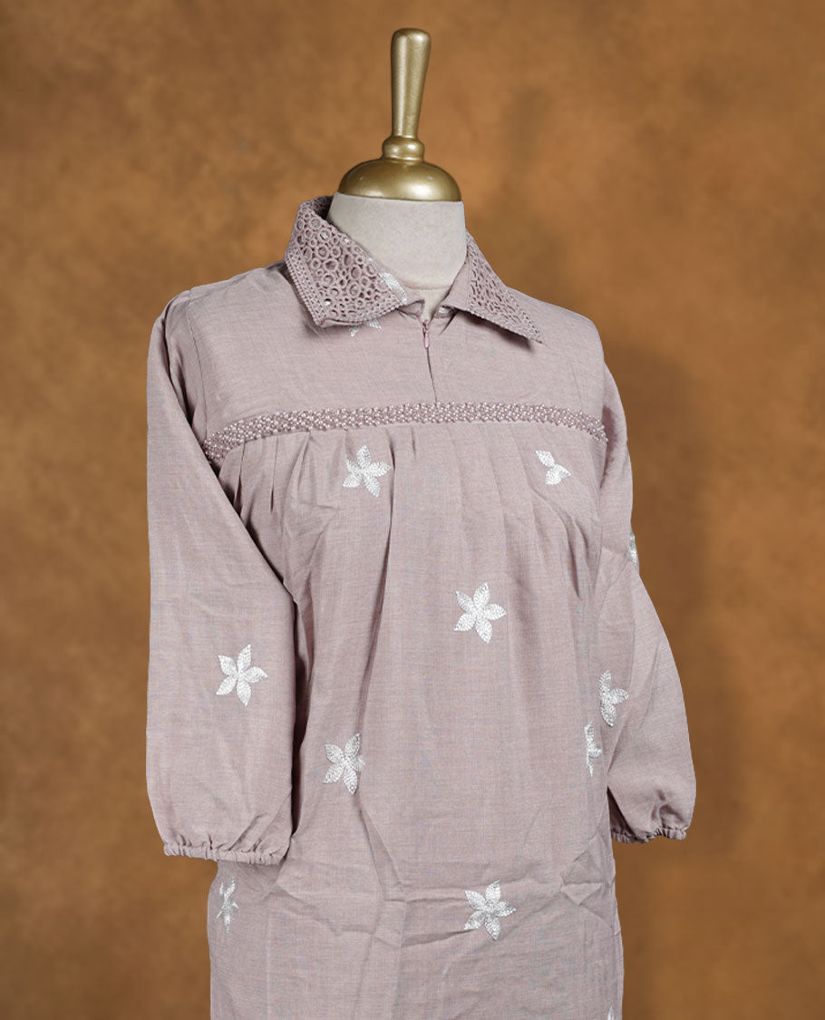 Dusty mauve embroidered nightwear kurti with delicate white floral thread work, crochet-detailed shirt collar, front yoke gathers, and half sleeves with soft elasticated hem.