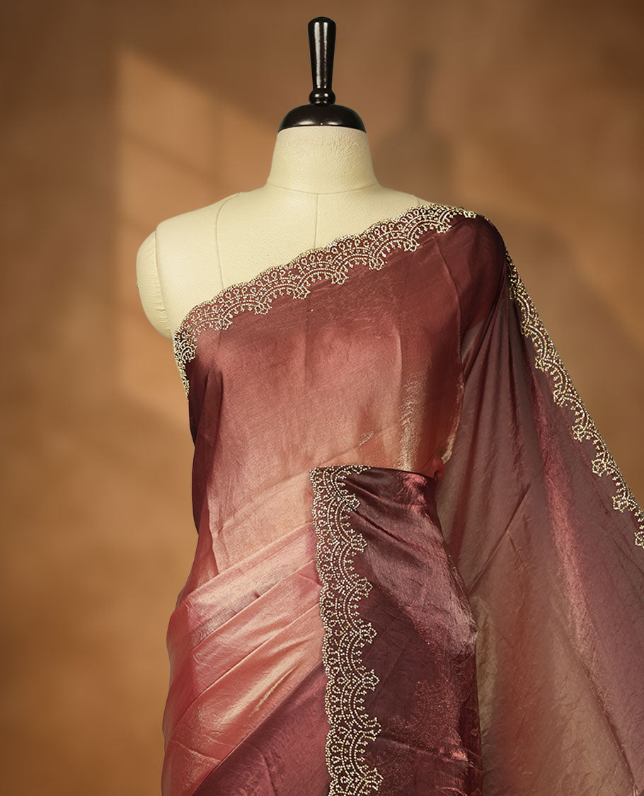 Chocolate Brown Colour shimmer fancy saree adorned  body, paired with a delicate with scattered gold stone worked border and matching blouse
