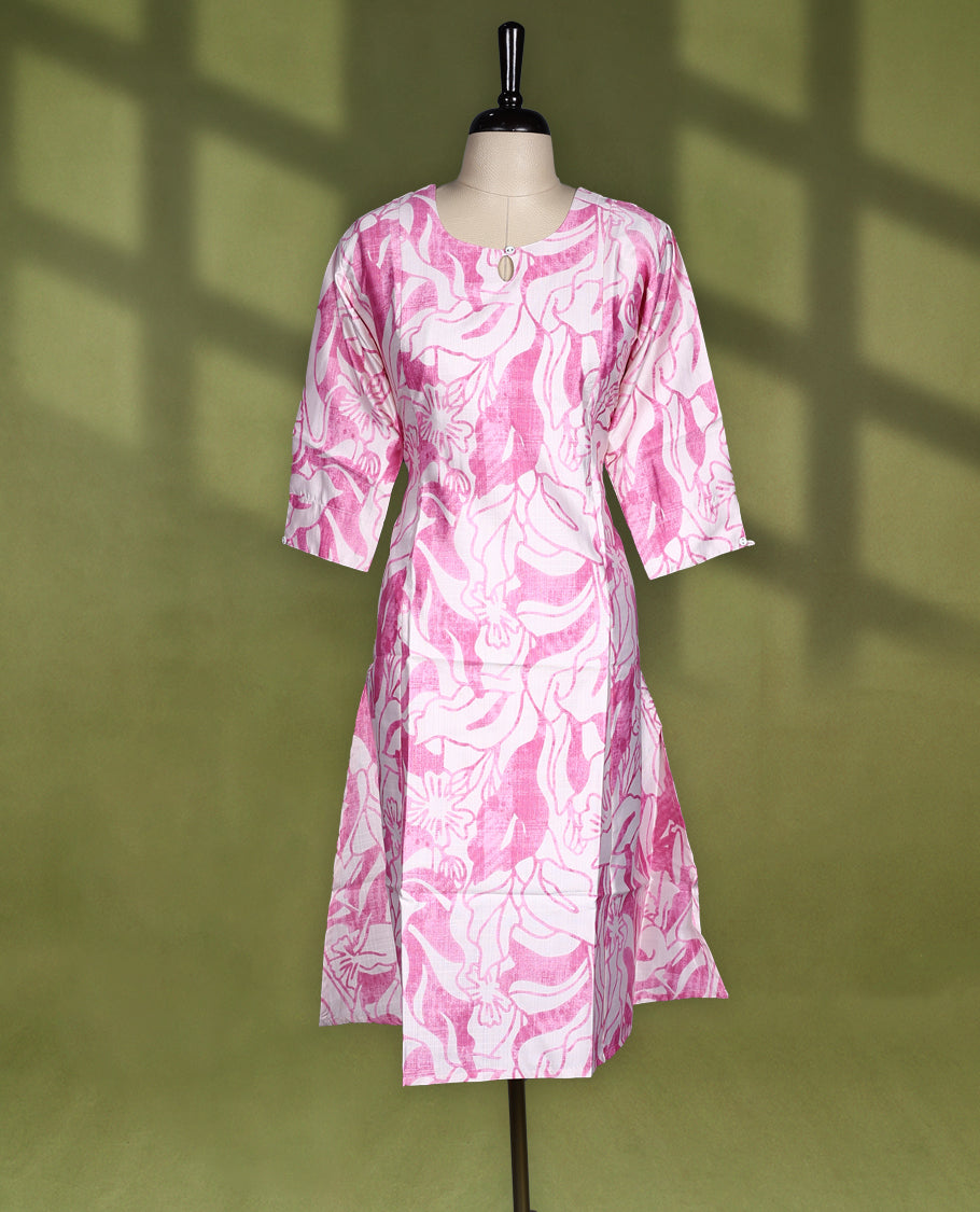 Off White and pink printed straight cut kurti featuring bold floral patterns all over, styled with a round neckline, keyhole detail, and 3/4th sleeves, perfect for a fresh and casual everyday look.
