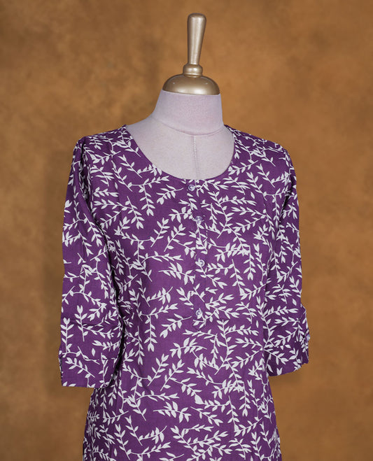 Violet and white colour kurti with White leaf kodi prints, knee length design, styled with a round neckline and a sleeve .