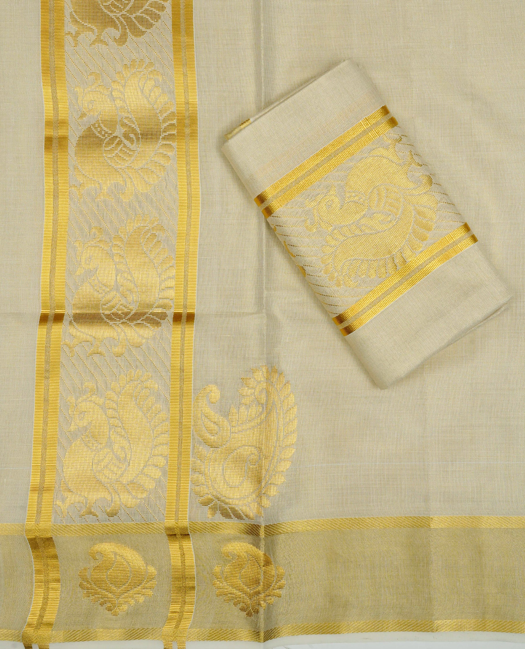 Cream Colour tissue set mundu featuring a plain body, enhanced with elegant Peacock Design on the gold zari kara.