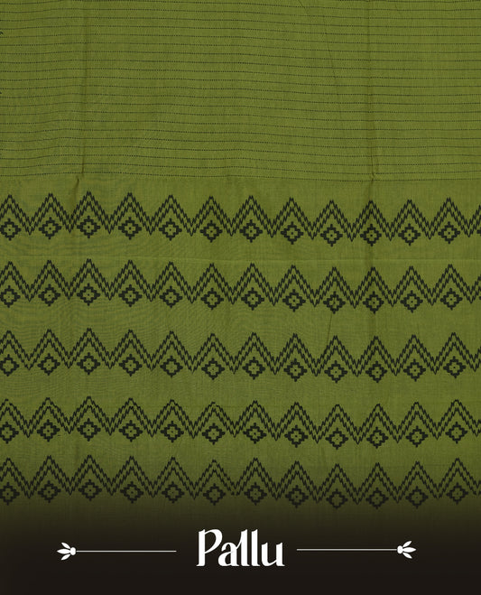 Green colour poly cotton saree with black vertical dotted line pattern on the body, paired with a matching pallu featuring black zigzag geometric border, and a coordinated all‑over black stylised fleur‑de‑lis printed blouse piece.