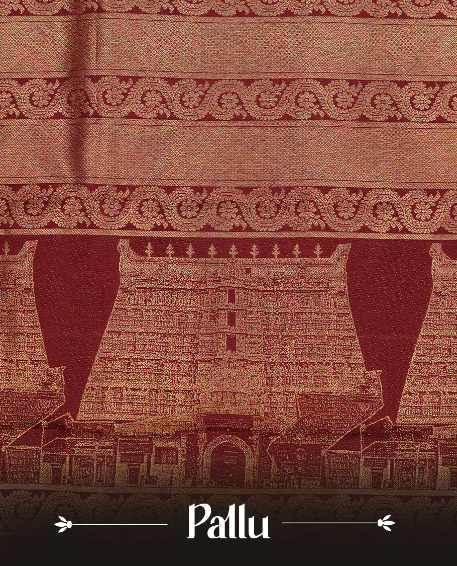 Dark Maroon colour Kanchipuram Samudrika Pattu saree featuring an exclusive gold zari weave of the historic Padmanabhaswamy Temple East Gopuram on the border and pallu, with Anantha Sayanam motif, paired with self colour blouse piece.