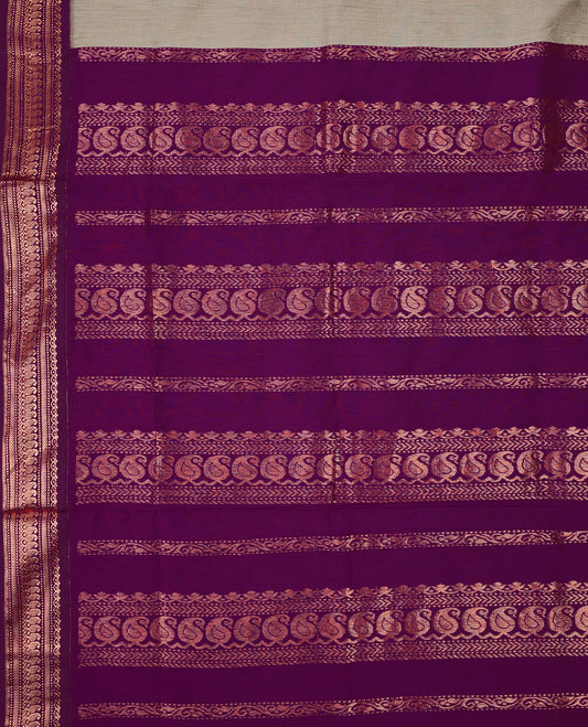 Grey colour mixed Kalyani cotton saree featuring Magenta zari Motifs throughout the body, paired with a Grape colour traditional border and pallu, with matching blouse