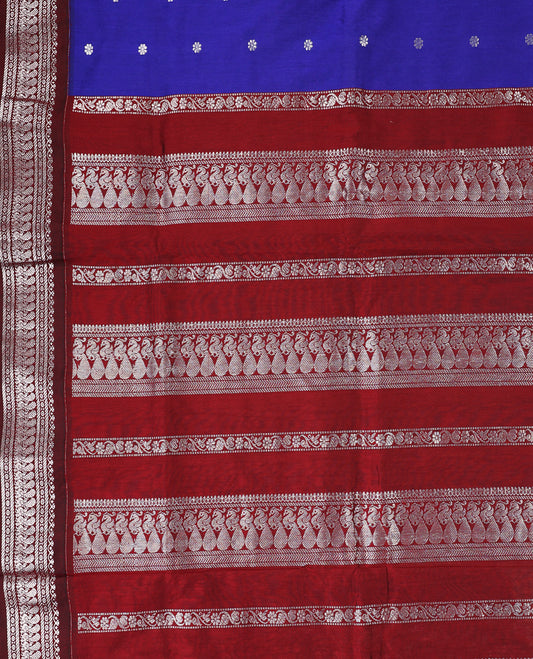 Blue colour mixed Kalyani cotton saree featuring Silver  zari flower motifs throughout the body, paired with a Maroon colour traditional border and pallu, with matching blouse