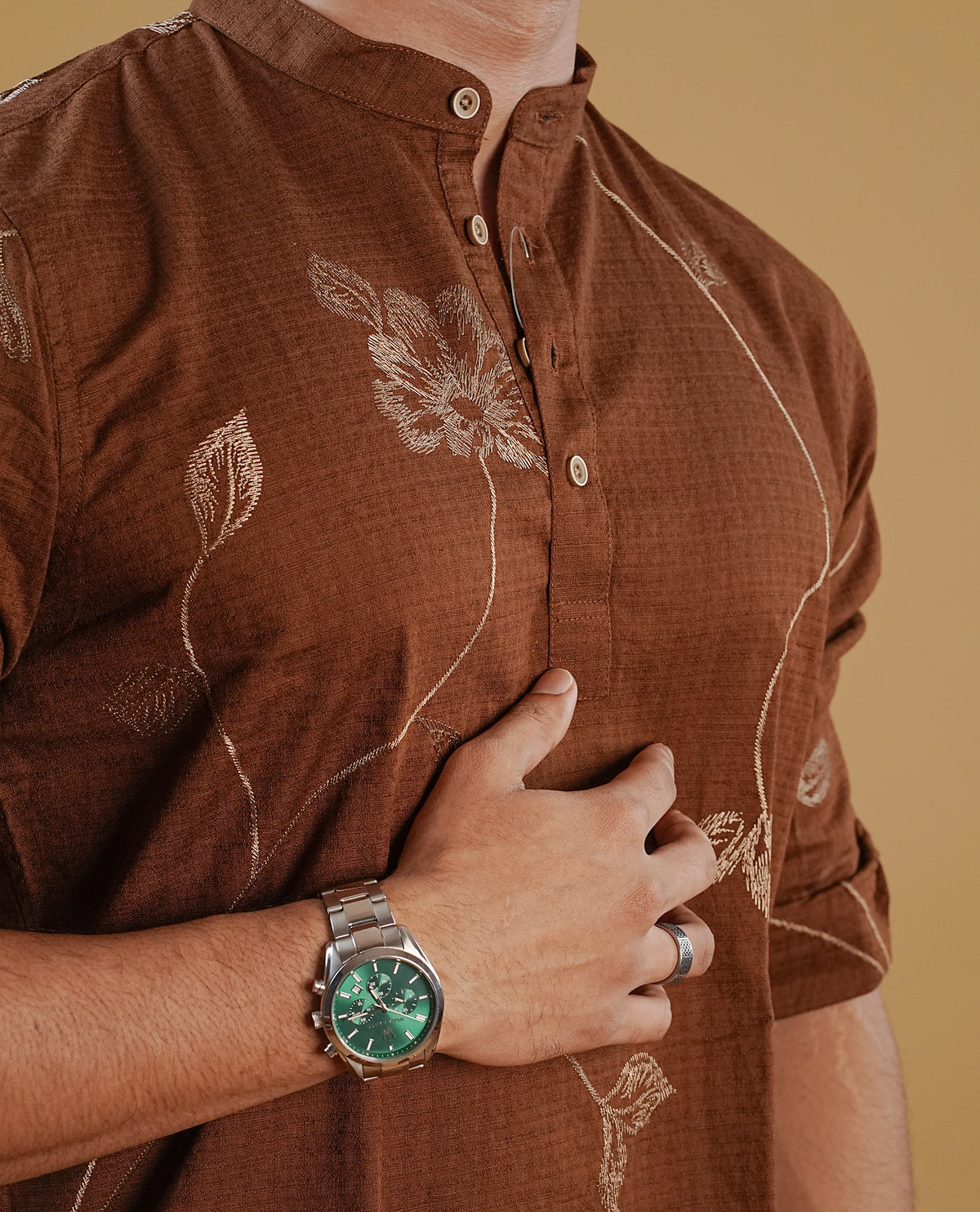 Brown colour men's kurta featuring elegant thread pattern on the body, complemented by sleeves for a refined and festive look.
