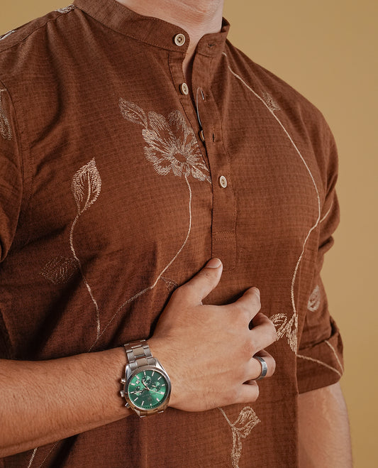 Brown colour men's kurta featuring elegant thread pattern on the body, complemented by sleeves for a refined and festive look.