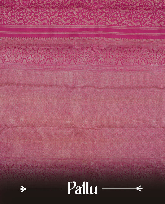 Magenta colour Kanchipuram pattern Manthrakodi saree featuring floral and peacock antique zari jacquard designs, traditional golden zari border and plain blouse piece with border.
