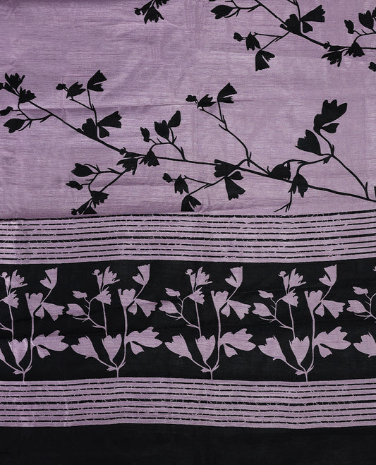 Pastel Purple colour semi printed saree featuring black florak kodi prints across the body, finished with a sleek plain border, with matching blouse