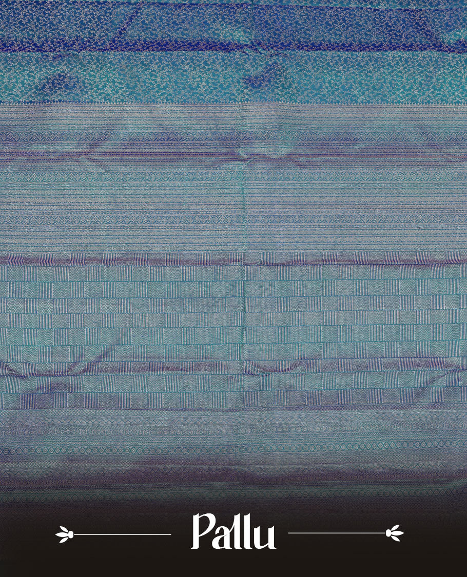 Peacock blue colour Kanchipuram pattern Manthrakodi saree featuring geometrical design antique copper zari floral pencil art jacquard design across the body, traditional mango & diamond designs on border, and self zari blouse piece.