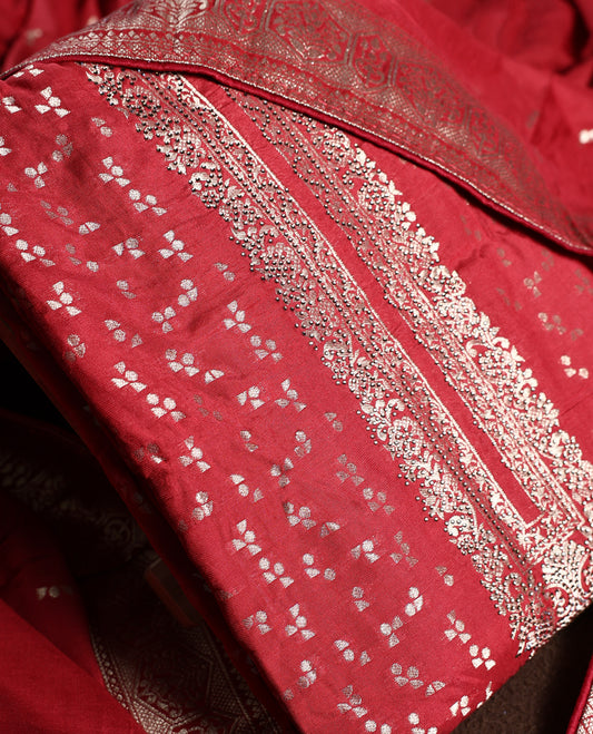 Reddish Brown churidhar material adorned with golden zari woven motifs and an elegant traditional border, paired with a plain matching bottom and grand dupatta, perfect for weddings, festive occasions, and celebrations.