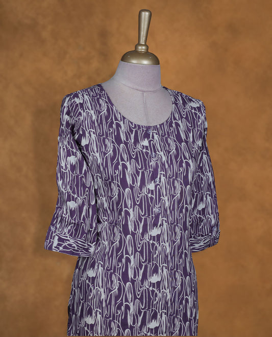 Violet and white colour kurti with White floral prints, knee length design, styled with a round neckline and a sleeve .