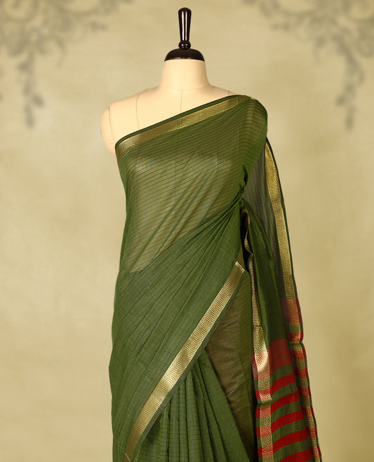 Grass Green colour chanderi cotton saree with fine striped body, mangalgiri border, grand pallu featuring Red and gold zari stripes, with matching blouse.