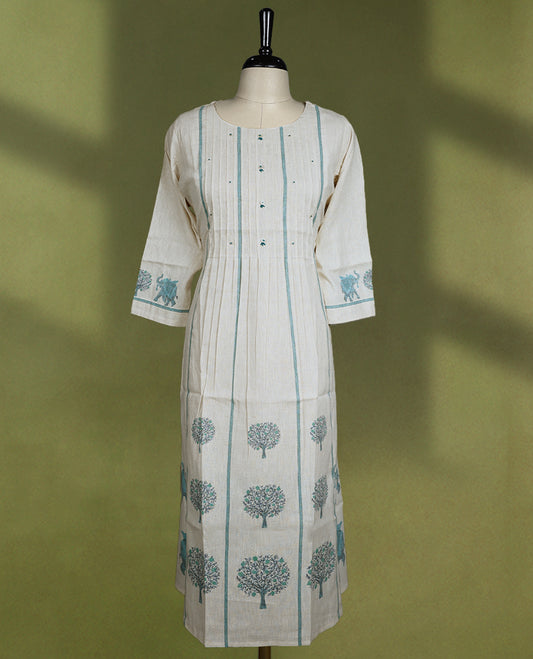 Beige colour kurta with a round neck and 3/4th sleeves, detailed with teal vertical pintucks, delicate embroidery, and block printed tree motifs.