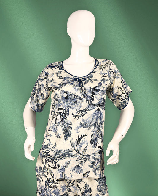 Beige and navy blue colour floral printed nightwear featuring a round neckline with a gathered yoke detail, short sleeves with gentle pleats, and relaxed straight-fit pants for an effortlessly stylish look.