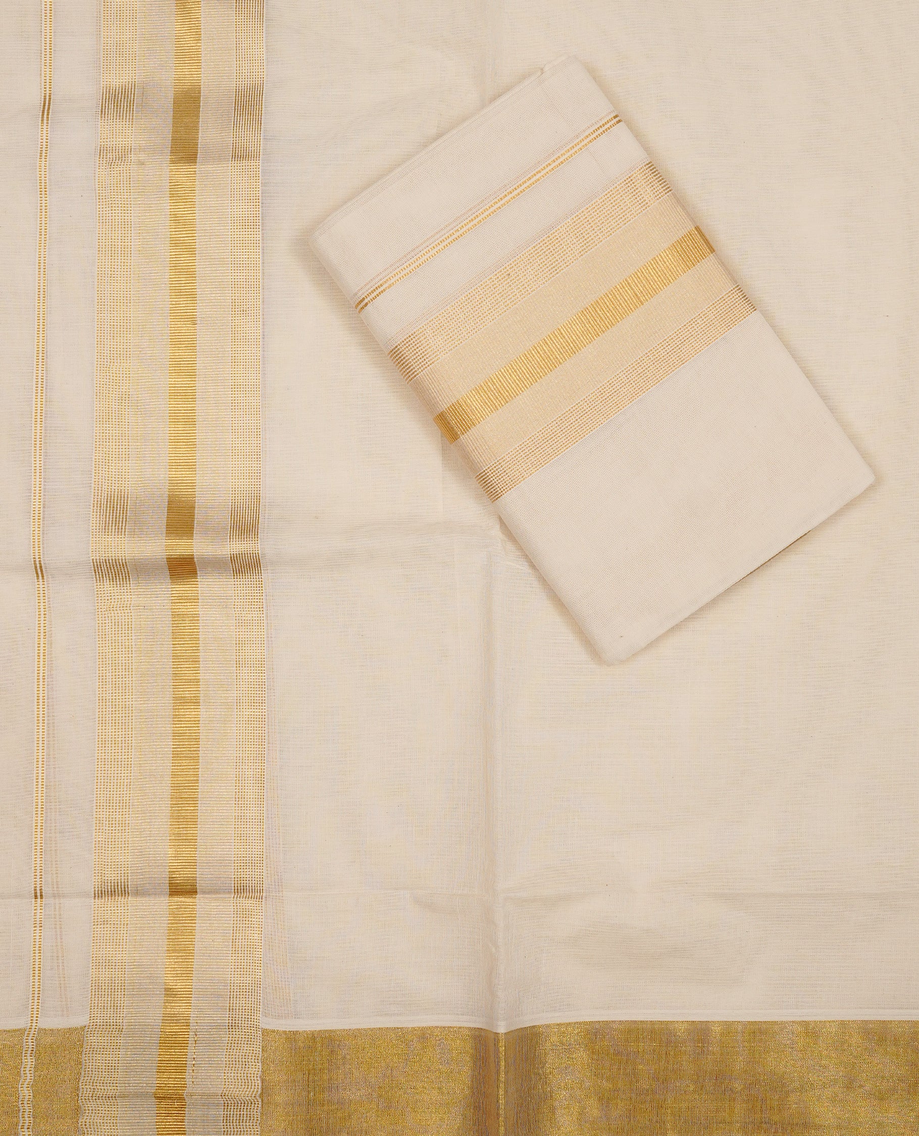 Off white colour Cotton Set Mund featuring a plain body, enhanced by a traditional zari border.