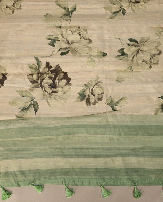 Cream colour semi silk printed saree adorned with soft green floral motifs across the body, finished with a light green striped border, with matching blouse