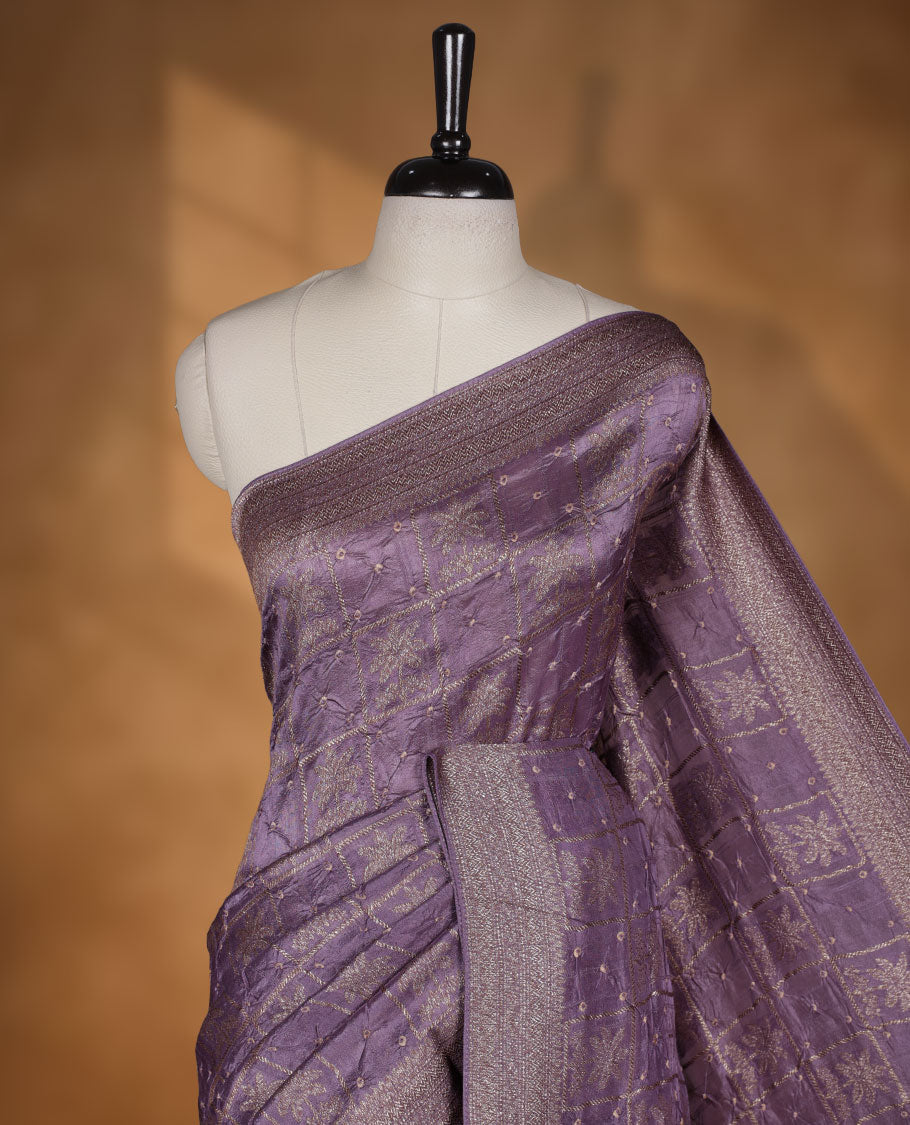 Dark Lavender colour Banarasi Bandhani silk saree featuring with intricate Banarasi motifs on body, complemented by antique zari woven border and grand pallu, paired with matching  blouse