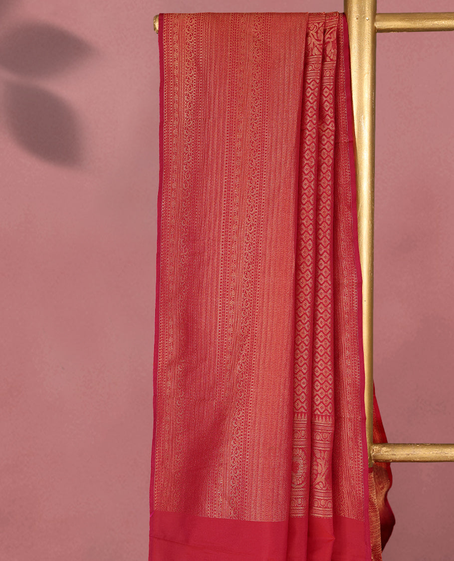 Rani Pink colour Kancheepuram saree featuring an antique zari brocade body, complemented by a traditional border and a matching blouse.