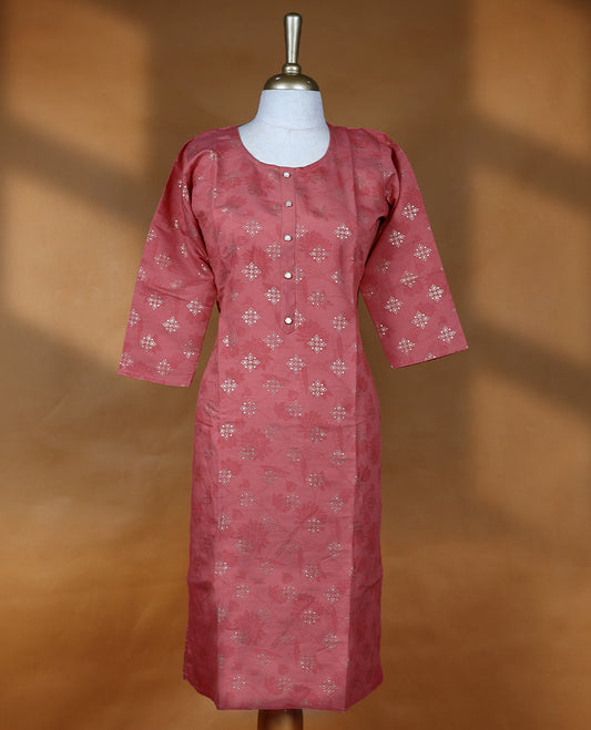 Dusty red colour kurti from TWARA, featuring intricate golden foil print in a geometric floral pattern, finished with a round neckline and a button-down front placket.