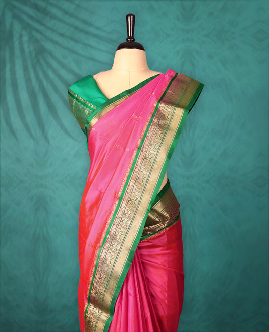 Pink colour Traditional Kancheepuram Silk saree with small gold motifs on body, Green traditional border with intricate gold zari weaving, grand zari pallu, perfect for Bharatanatyam, with matching blouse.