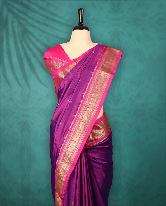 Violet colour Traditional Kancheepuram Silk saree with small gold motifs on body, Rich Magenta traditional border with intricate gold zari weaving, grand zari pallu, perfect for Bharatanatyam, with matching blouse.