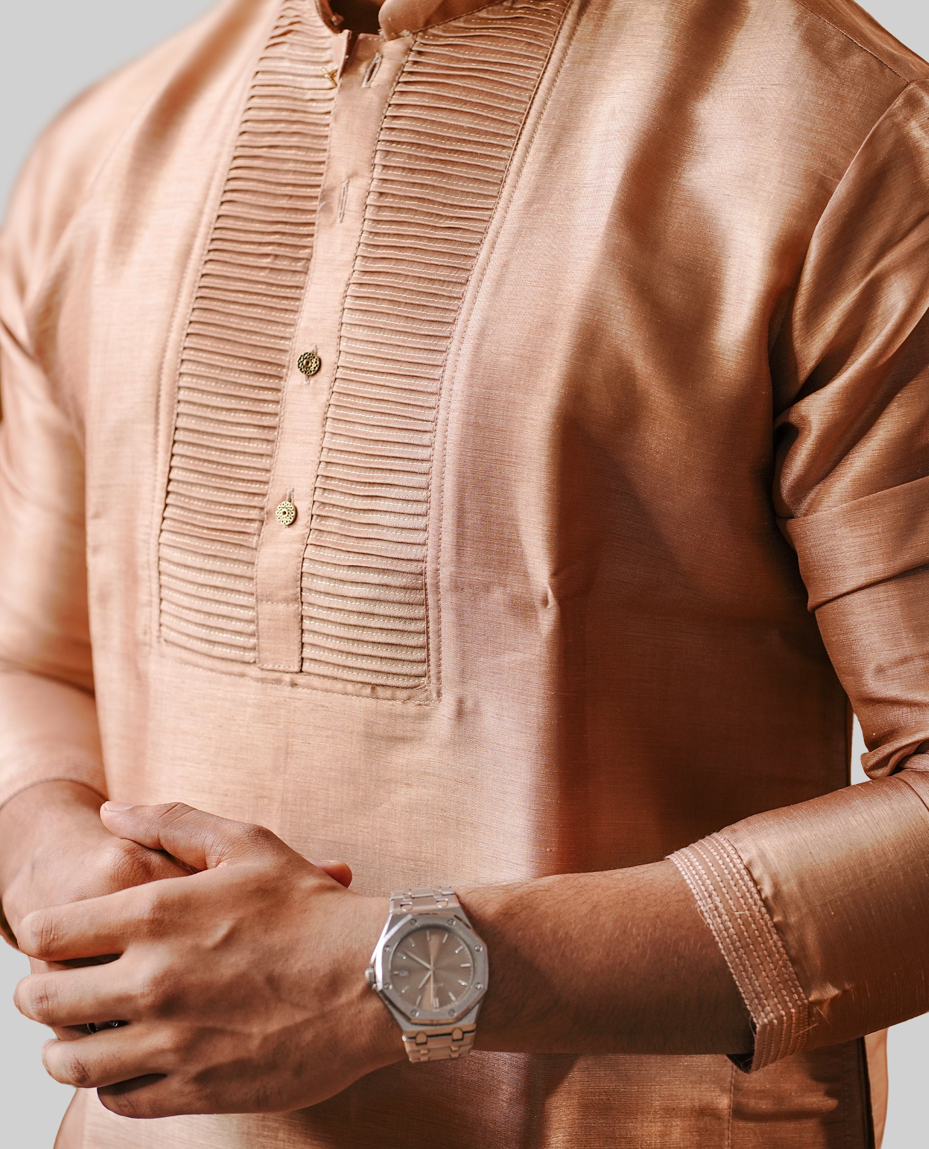 Light coffee colour men's kurta featuring elegant small Pleated work on the body, complemented by full sleeves for a refined and festive look.