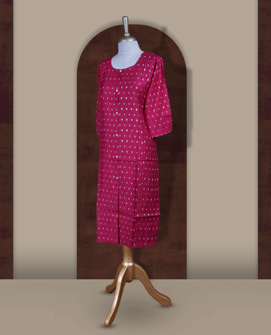 Rani pink colour kurti from TWARA, adorned with all over golden foil prints in geometric motifs, finished with a round neckline and elbow length sleeves for a graceful ethnic look.
