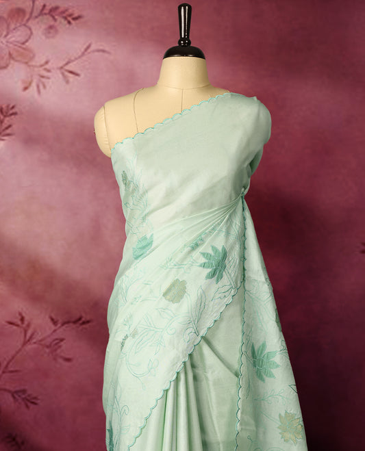 Pastel sea green colour pure tussar silk lightweight saree with self colour floral kodi embroidery and tissue fabric applique work on the body, scallop embroidery worked border, with matching self colour plain blouse