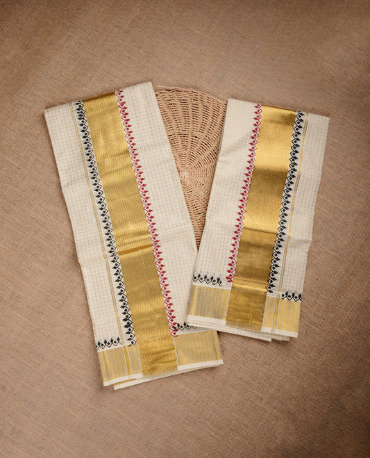 Cream colour cotton set mundu highlighting gold zari check pattern obdy, gold zari with maroon colour pattern on body.