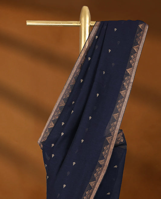 Navy Blue colour soft khadi cotton saree with small Beige Zari motifs on the body, detailed woven Gold zari border, paired pallu with tussles, with matching blouse.