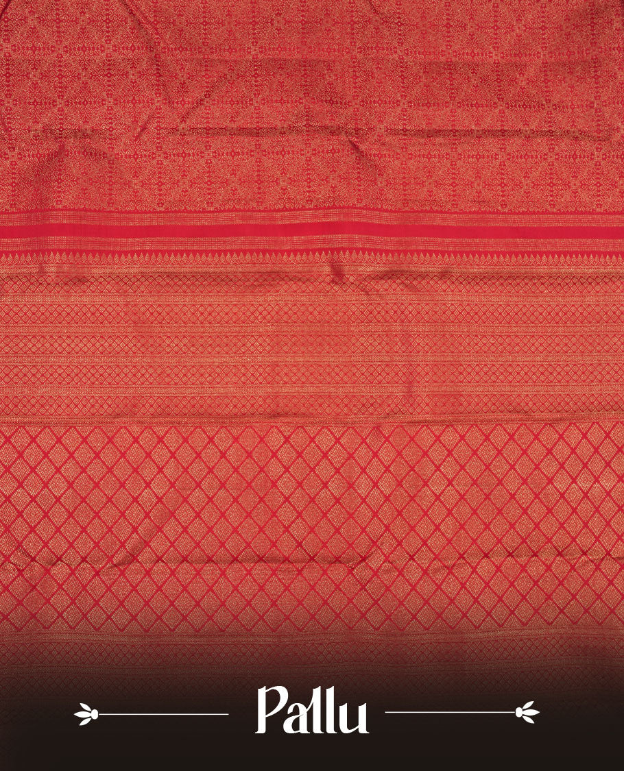 Maroon colour Kanchipuram pattern Manthrakodi saree adorned with antique zari jacquard work featuring elegant geometrical patterns across the body, complemented by a matching jacquard blouse piece for a regal finish.