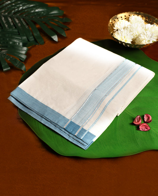 Off white cotton single dhoti featuring a sky blue kara with fine double line edging, crafted for traditional elegance and daily comfort, perfect for rituals, temple visits, and cultural occasions.