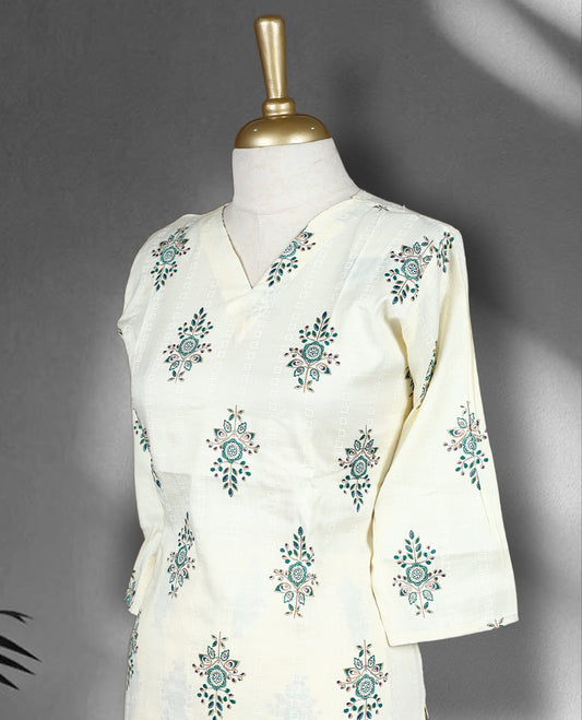 Off white colour Cord set with dark green and violet floral block print, featuring a V neck top with a straight cut silhouette and side slits, paired with matching straight fit pants.