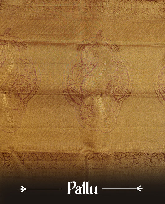 Pinkish beige & goldcolour kancheepuram tissue silk saree highlighting gold floral zari pattern body, with contrast Pinkish beige colour colour with traditional border and paired with matching blouse.