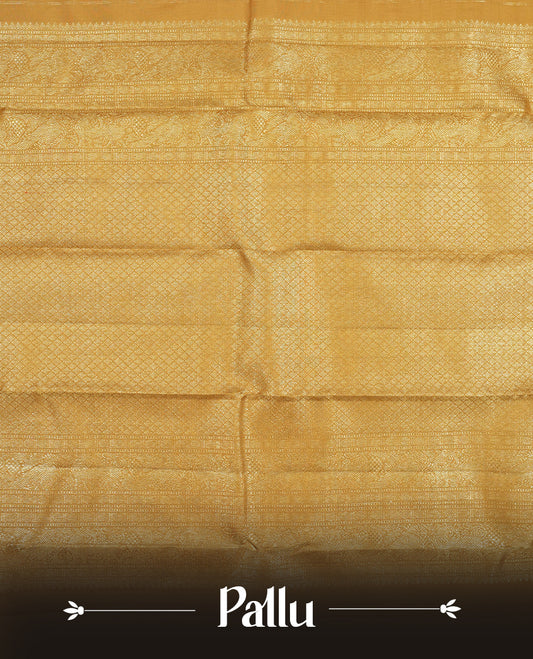 Gold colour Kanchipuram Samudrika Silk Saree featuring patterns weaving with gold zari jacquard and a traditional zari border, paired with a matching designer jacquard blouse piece