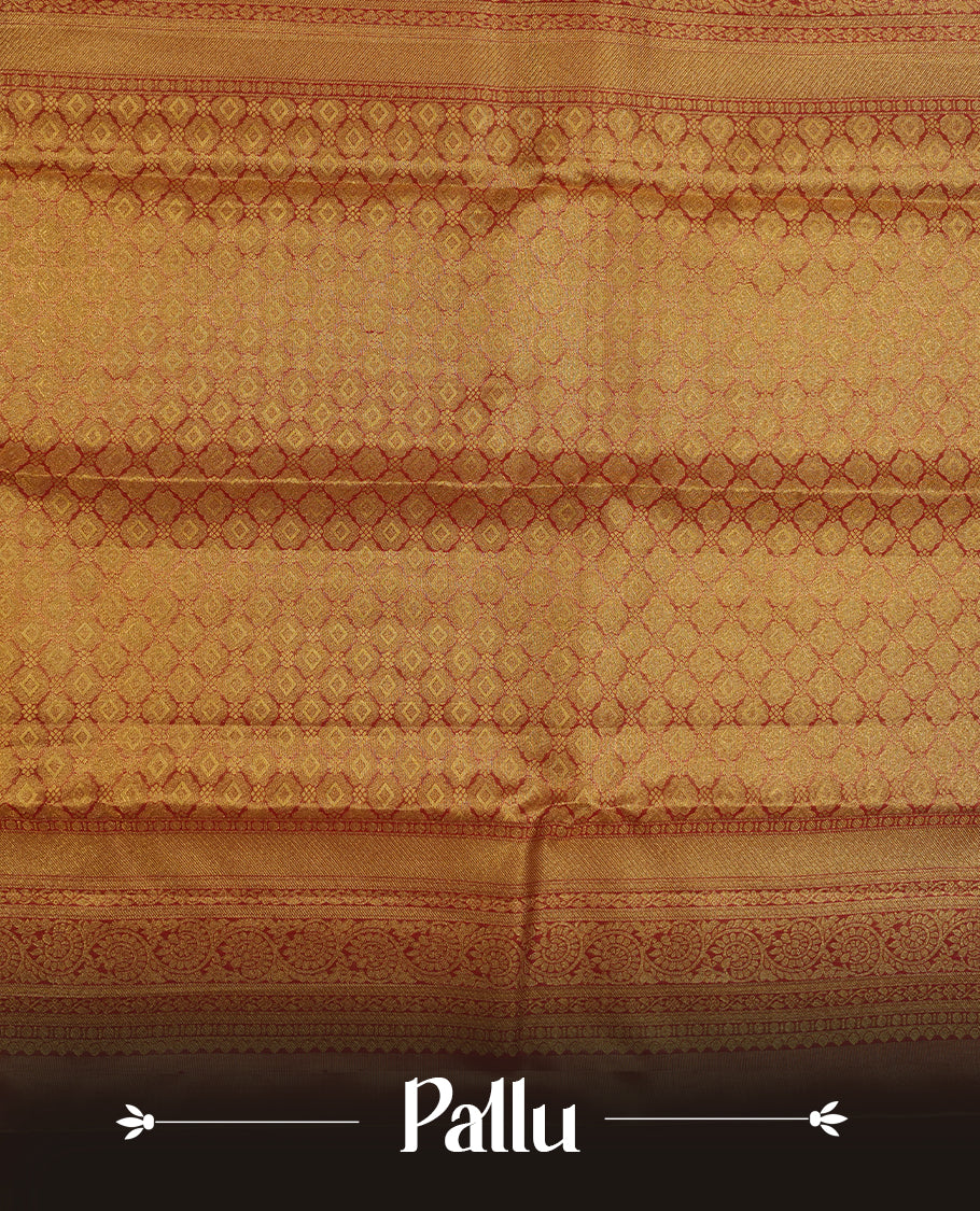 Red & gold double shade kancheepuram tissue silk saree highlighting gold floral zari pattern body, with contrast burgundy colour colour with kodi traditional border and paired with matching blouse.