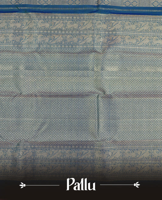 Peacock colour Kanchipuram Samudrika Silk Saree featuring Leaf & square pattern weaving with Light gold zari jacquard and a traditional Zari border, paired with a matching designer jacquard blouse piece