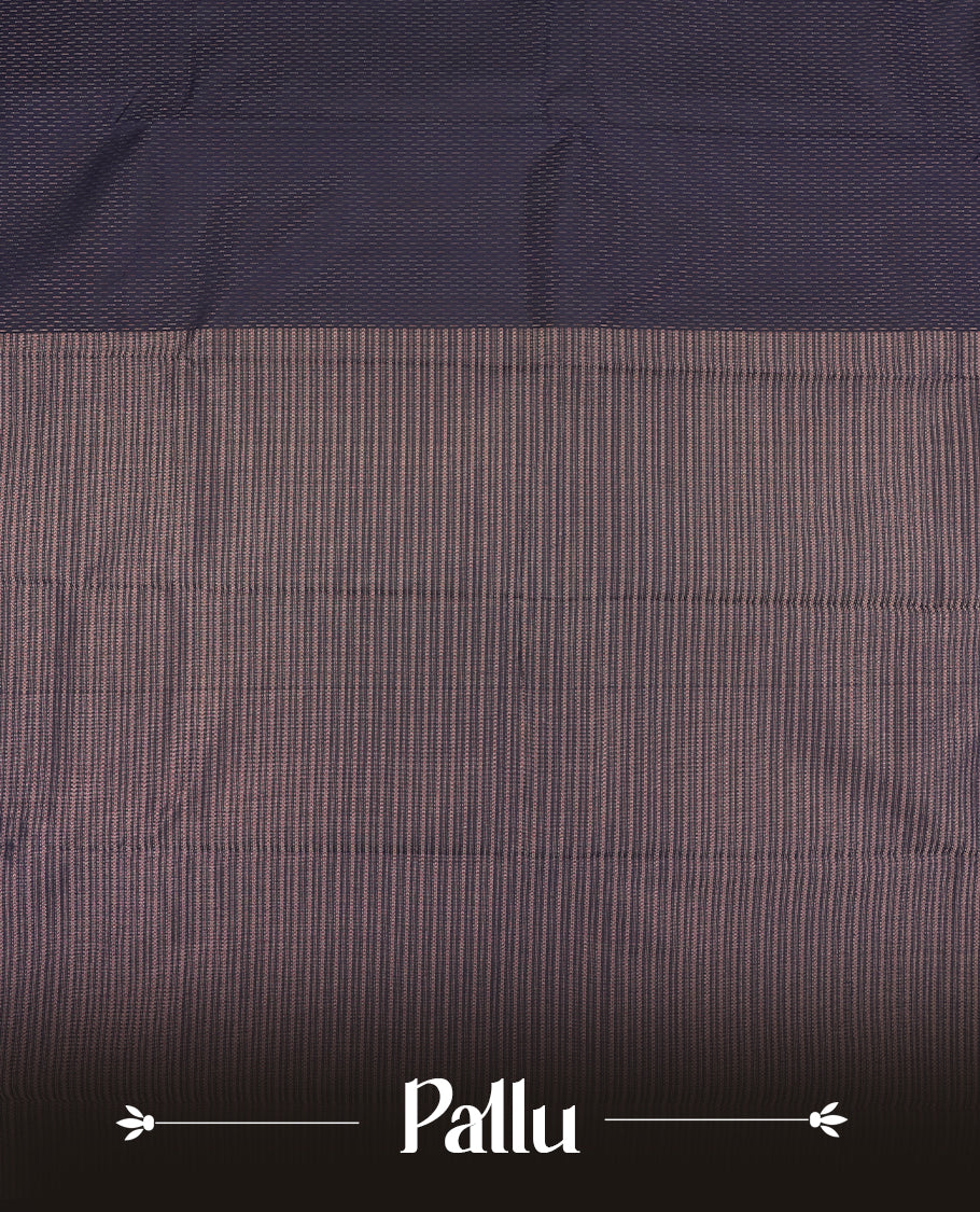 Navy blue colour semi soft silk saree featuring a gold short line patterned body, complemented by pallu & gold border and a matching blouse piece.