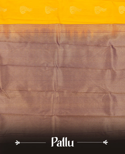Gold yellow colour Semi Silk Saree with gold zari patterns on the body, paired with a contrasting dark violet colour traditional pallu and border, and a matching blouse piece.
