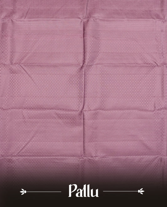 Medium grape colour semi soft silk saree featuring a self coloured textured patterned body, complemented by self coloured Square motifs on pallu & border and a matching blouse piece.