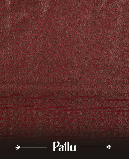 Maroon Colour Semi Banarasi Katan Silk Saree with Gold Zari Buti Motifs, Traditional Gold Floral Pallu, Elaborate Woven Border, Decorative Tassels with Matching Blouse