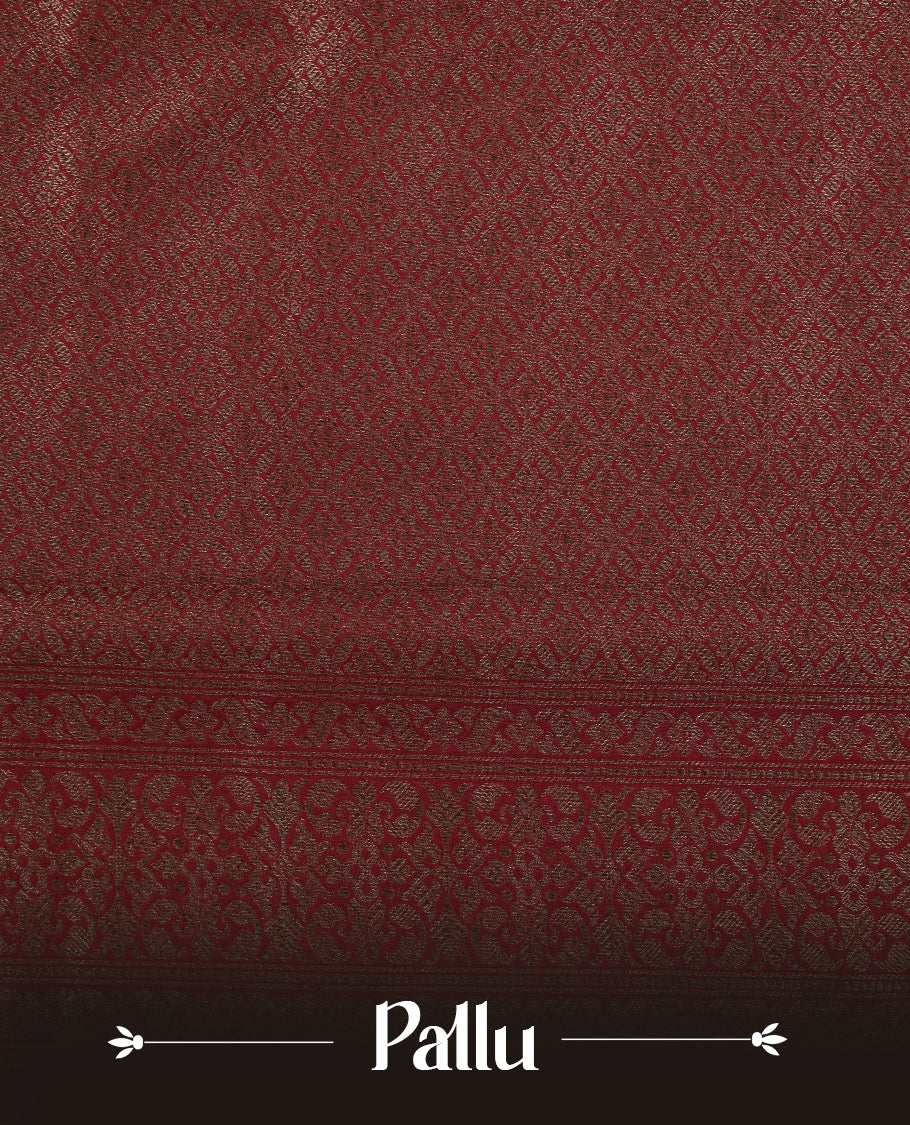 Maroon Colour Semi Banarasi Katan Silk Saree with Gold Zari Buti Motifs, Traditional Gold Floral Pallu, Elaborate Woven Border, Decorative Tassels with Matching Blouse