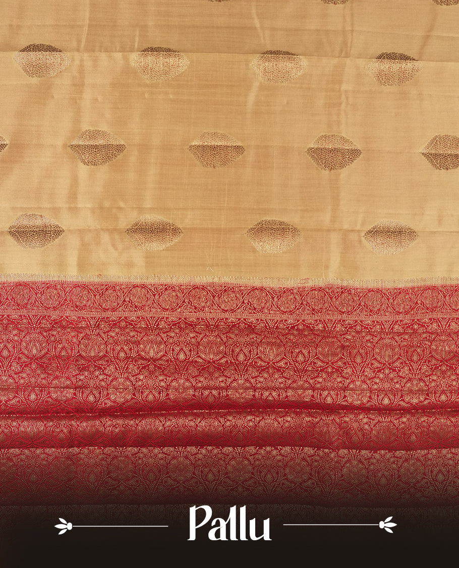 Cream Beige Colour Banaras Soft Silk Saree with Gold Zari Leaf Diamond Buttas, Intricate Multi-Layered Floral Border, Grand Pallu with Ornate Floral Brocade Motifs in Deep Red and Gold Tones, and Matching Red Blouse.