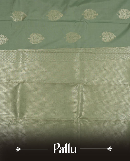 Pastel Mint colour semi soft silk saree featuring a self coloured golden textured patterned body, complemented by self coloured with gold traditional motifs on pallu & border and a matching blouse piece.