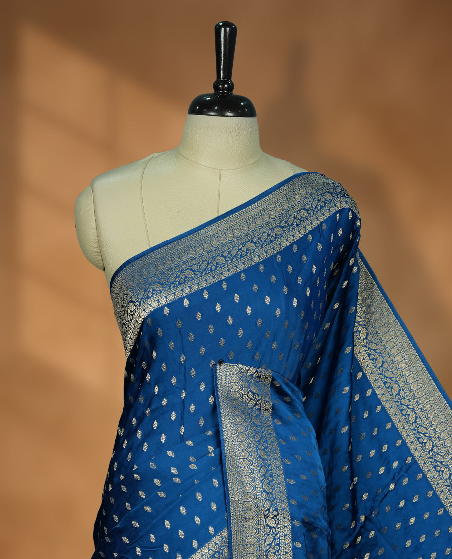 Royal Blue Colour Semi Banarasi Satin Crepe Saree with Silver Zari Buti Motifs, Traditional Gold Floral Pallu, Elaborate Woven Border, Decorative Tassels with Matching Blouse