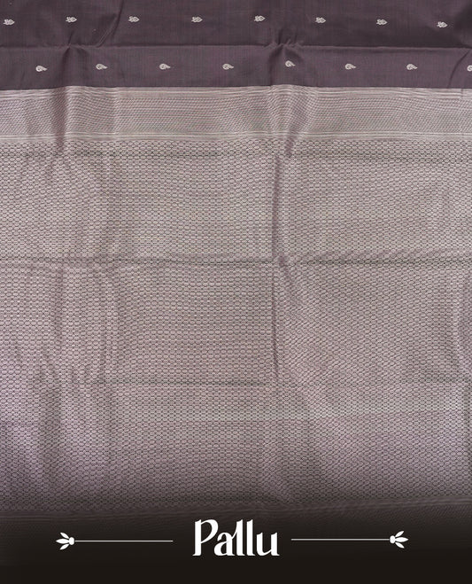 Purple taupe colour semi soft silk saree featuring a gold peacock & floral motifs body, complemented by gold traditional pallu & border and a matching blouse piece.